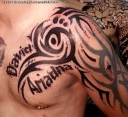 Tattoo Of Tribal Names Chest