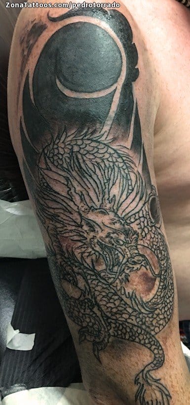 Foto de tatuaje Dragones, Orientales, Brazo