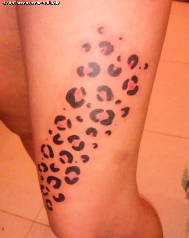 cheetah print tattoos on thigh