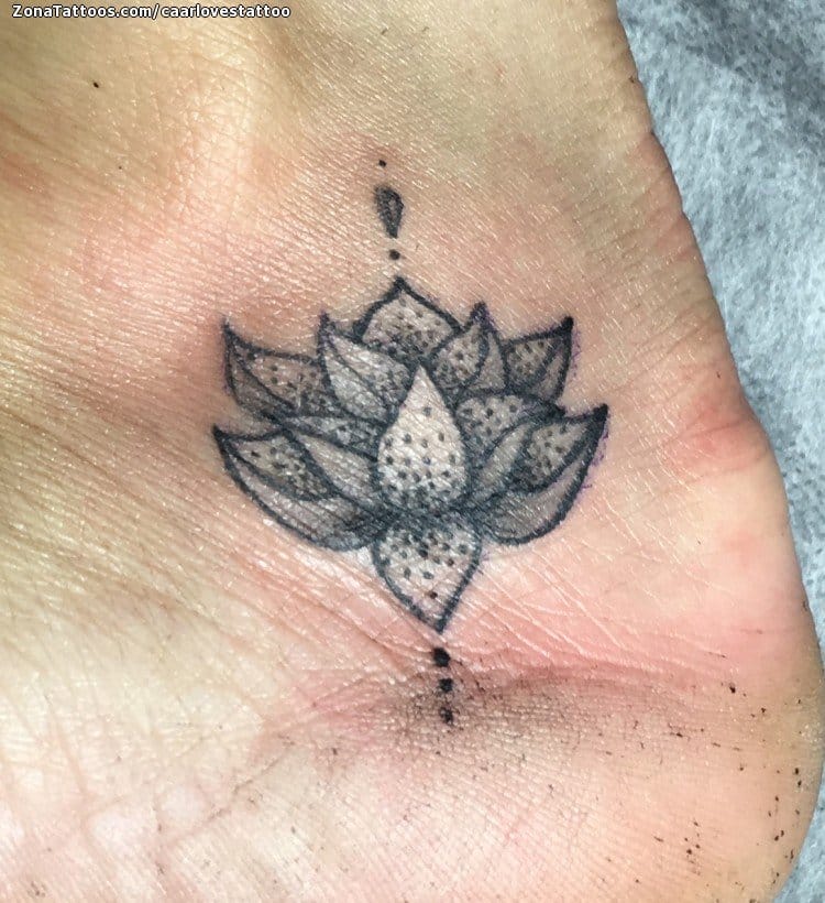 Lotus flower tattoo located on the ankle
