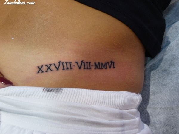 roman numeral tattoos ribs men