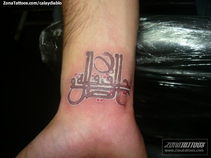 Tattoo photo Arab, Letters, Wrist