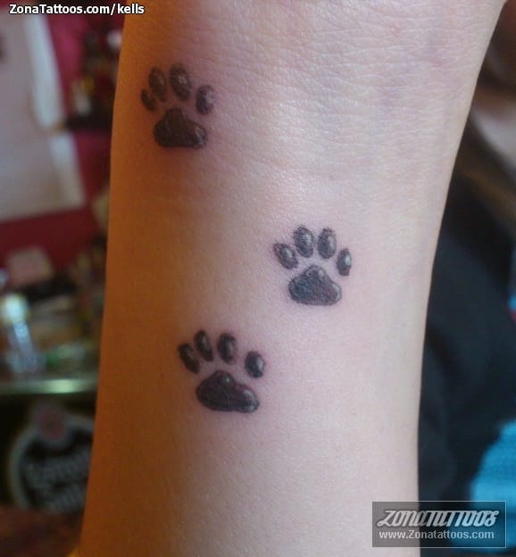 Tattoo photo Footprints, Forearm