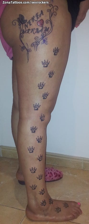 Foto de tatuaje Huellas, Pierna