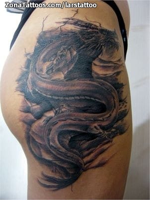 Foto de tatuaje Dragones, Muslo