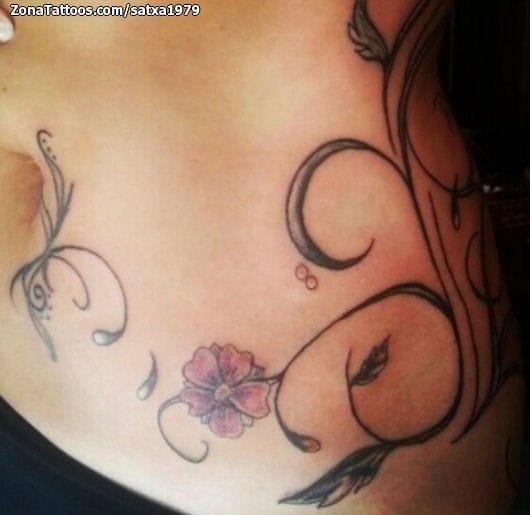 Foto de tatuaje Flores, Filigranas, Cadera