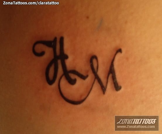 H and outlet m tattoo