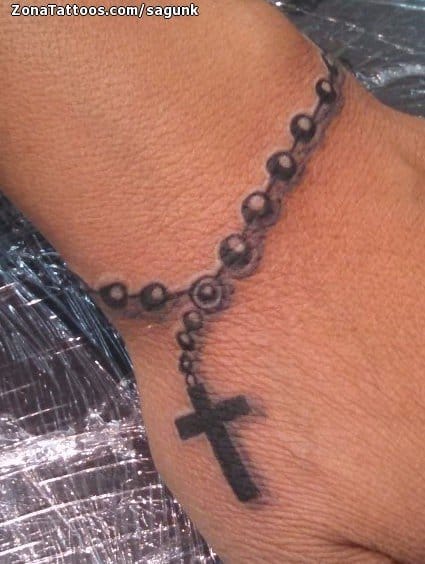 rosary on hand tattooTikTok Search